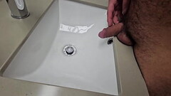 Hairy gay pissing in sink Thumb